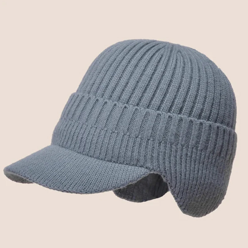 Еластична, топла плетена шапка, която предпазва ушите ви ☃️