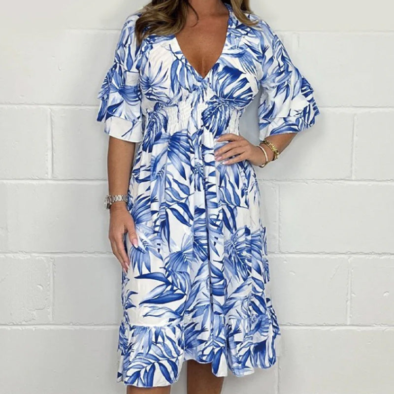 👗✨ Елегантни дамски рокли с V-образно деколте и ботанически мотив