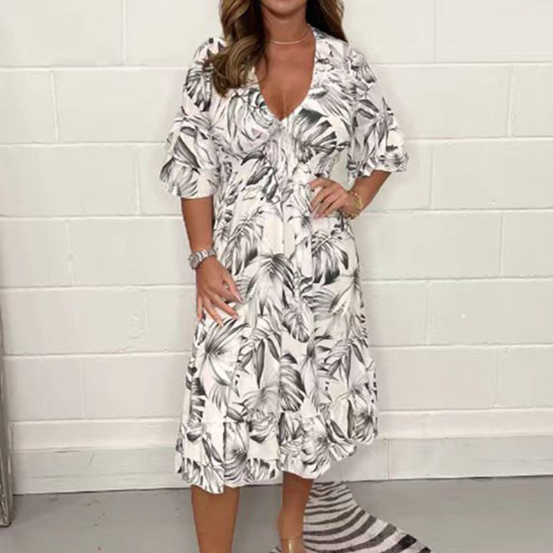 👗✨ Елегантни дамски рокли с V-образно деколте и ботанически мотив